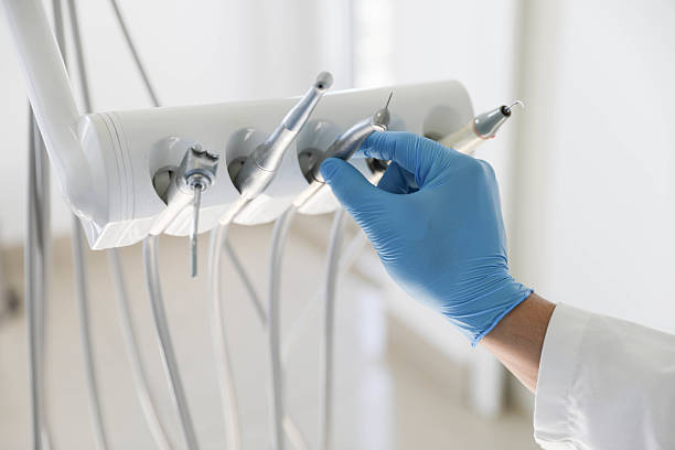 Professional Tooth Extraction technician working in Sharpsburg, NC